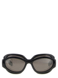Lunettes de soleil noires Balenciaga en polyamide avec monture élégante et moderne, vue de face.