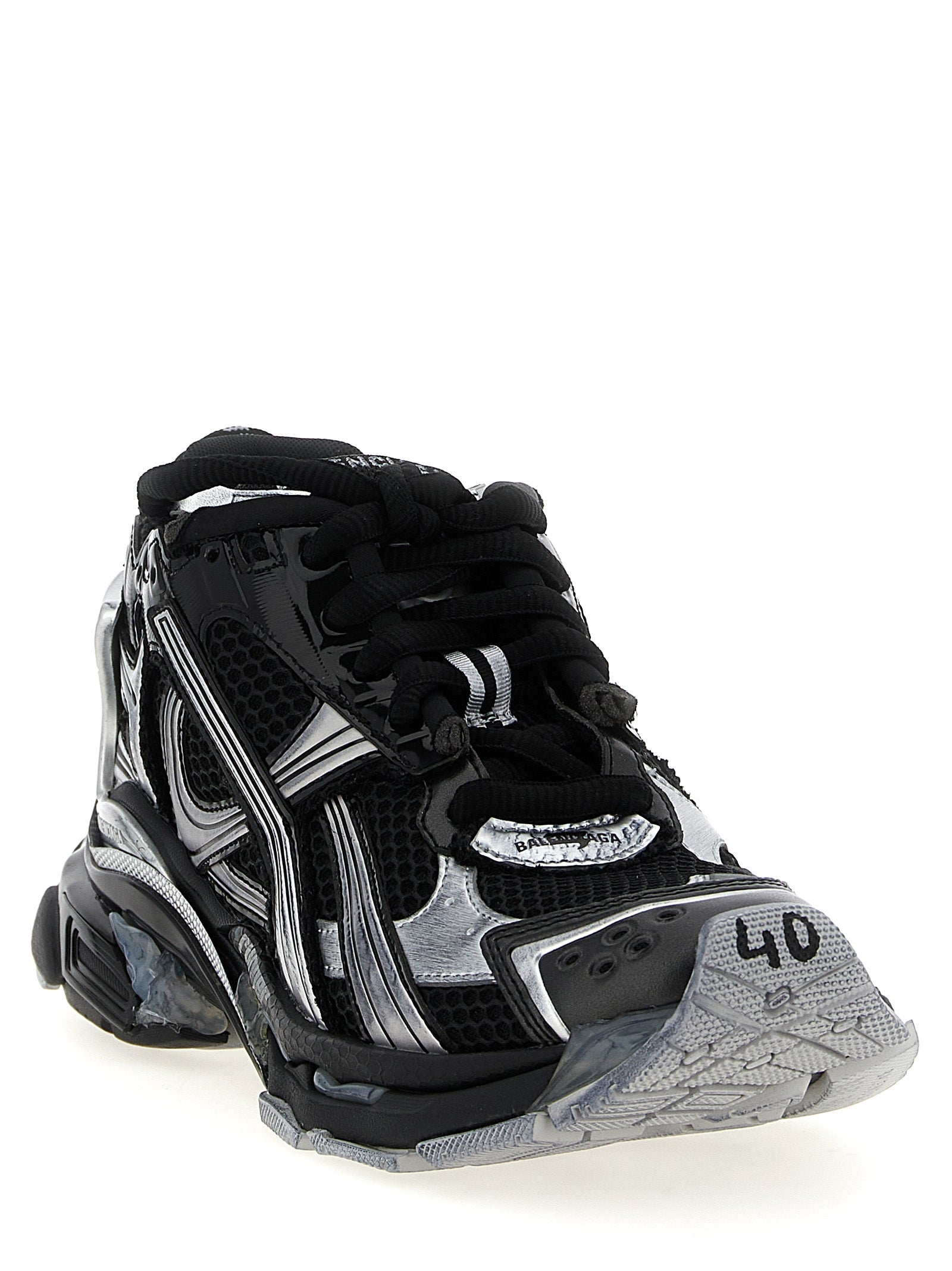 Chaussures de sport Balenciaga en polyéthylène noir, basket athlétique avec design moderne et semelle épaisse.