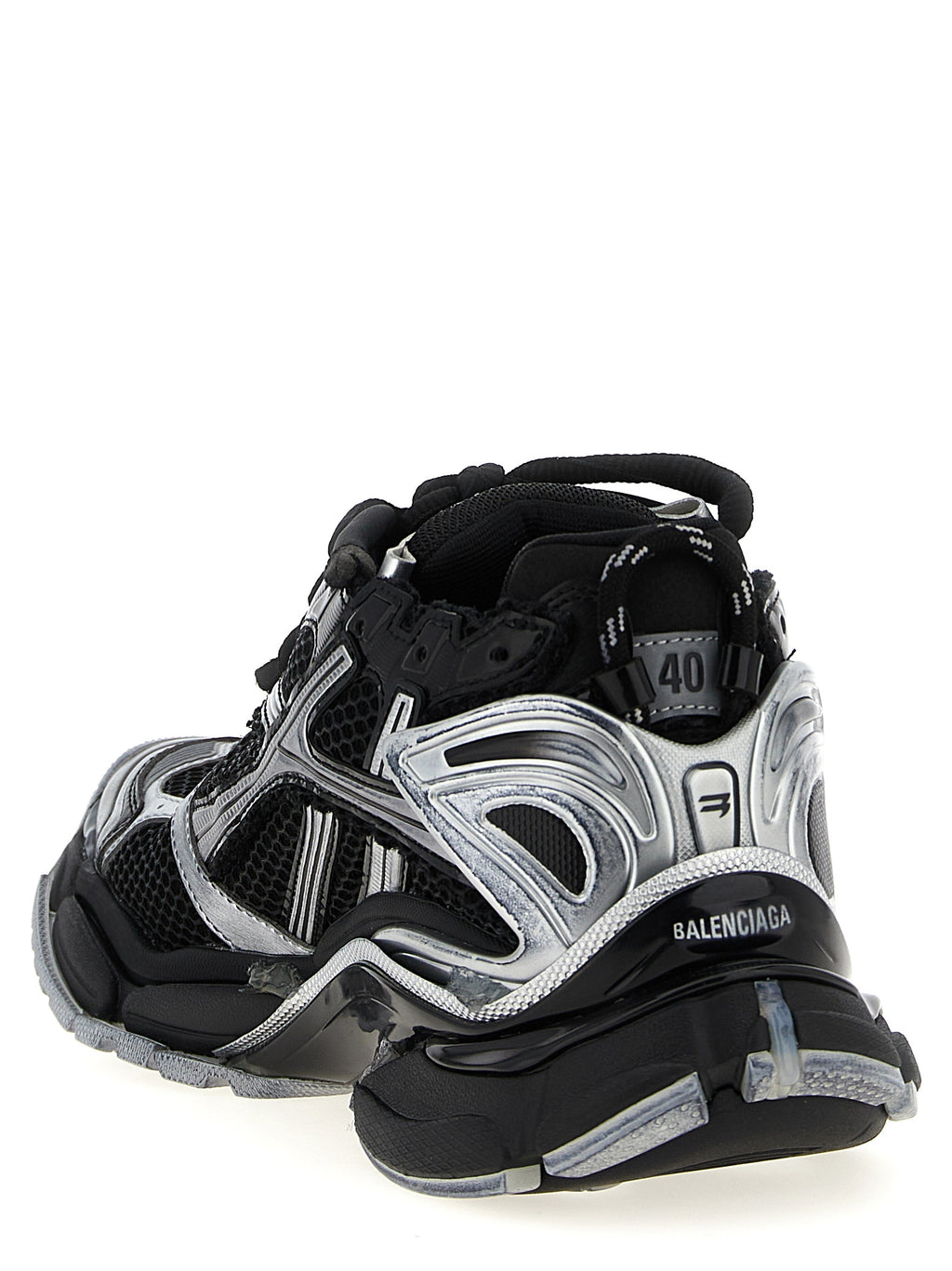 Chaussures de sport Balenciaga en polyéthylène noir, baskets athlétiques modernes avec semelle épaisse et design contemporain.