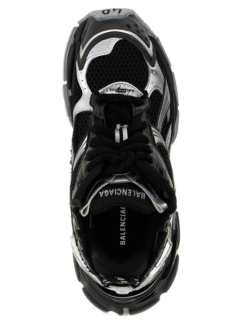 Chaussures de sport Balenciaga en polyéthylène noir, baskets athlétiques modernes avec semelle épaisse et design tendance.