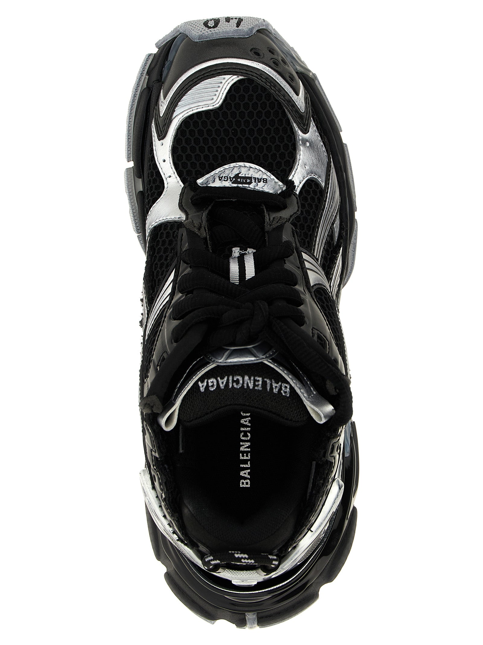 Chaussures de sport Balenciaga en polyéthylène noir, baskets athlétiques modernes avec semelle épaisse et design tendance.