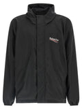 Veste en polyester noire Balenciaga, coupe moderne avec col montant et poches latérales, vue frontale.