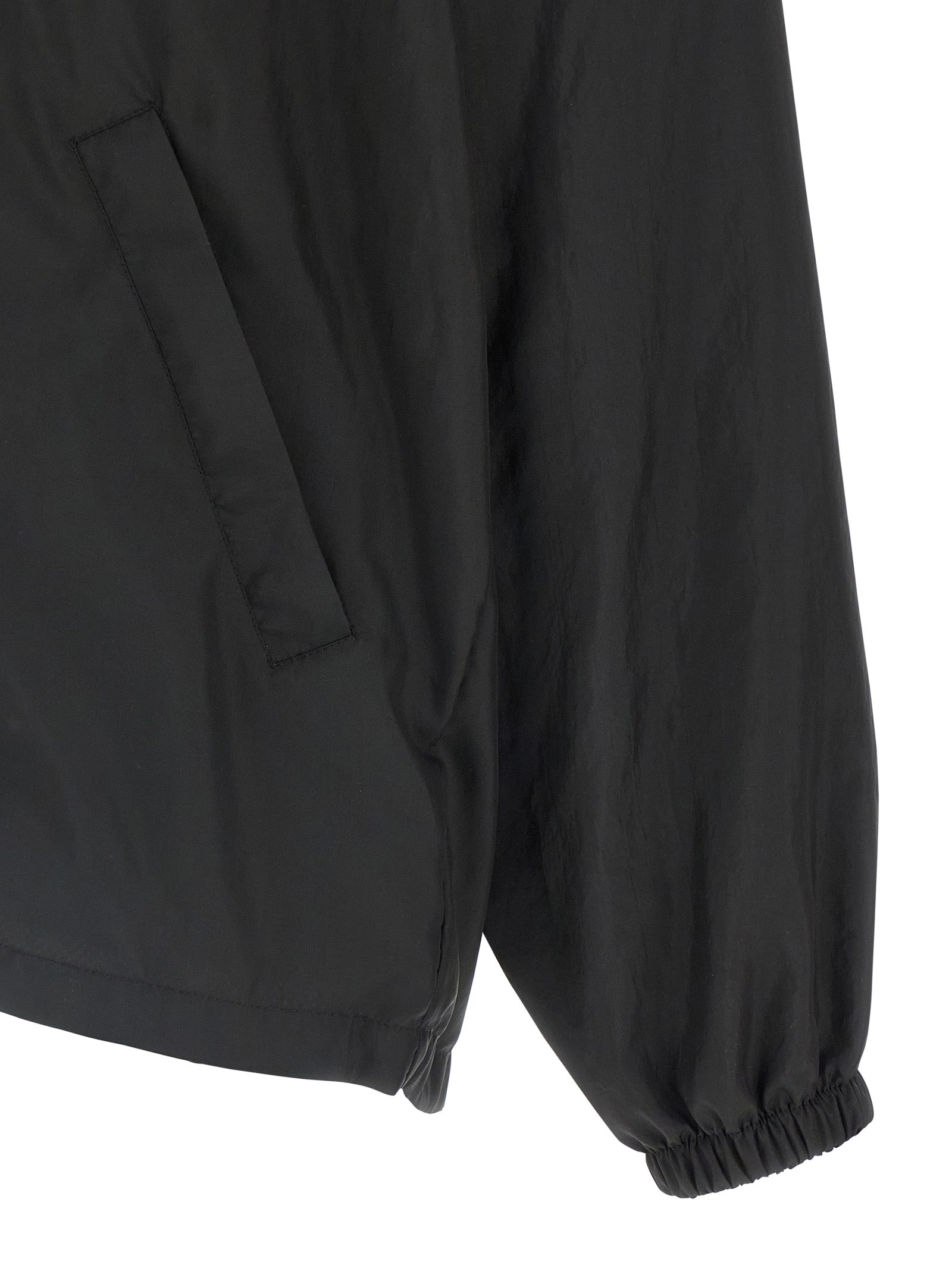 Veste shell en polyester noire de Balenciaga, coupe moderne avec détails résistants et style tendance.