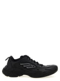 Sneakers athlétiques noires en cuir de veau de Balenciaga, vue de face, avec semelle blanche et design moderne.