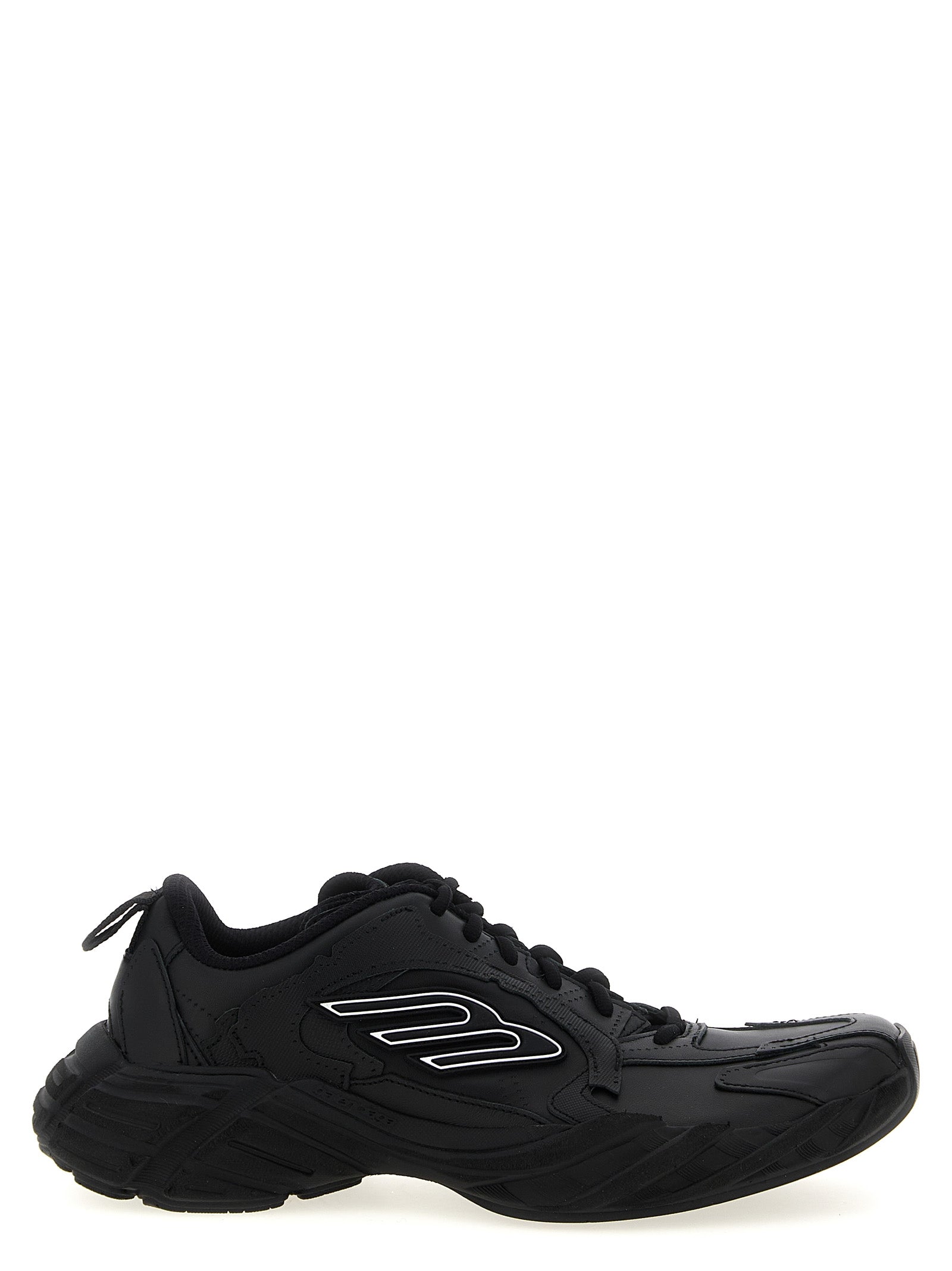 Sneakers athlétiques noires en cuir de veau de Balenciaga, vue de face, avec semelle blanche et design moderne.