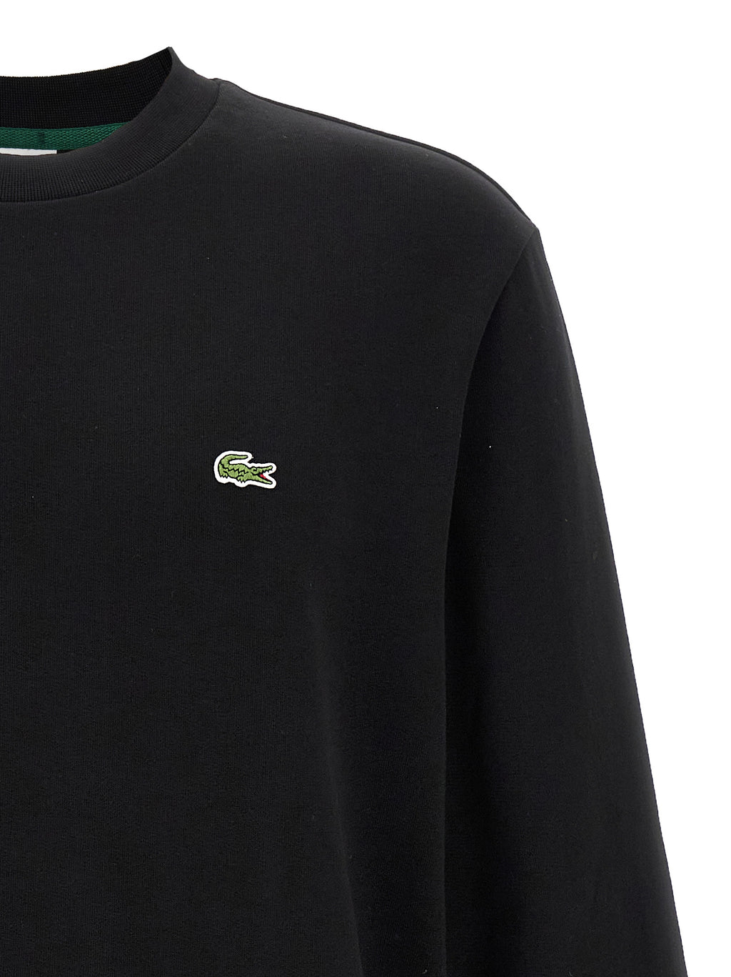 Sweat-shirt en coton noir de marque Lacoste, à col rond et logo crocodile sur la poitrine, pour homme.