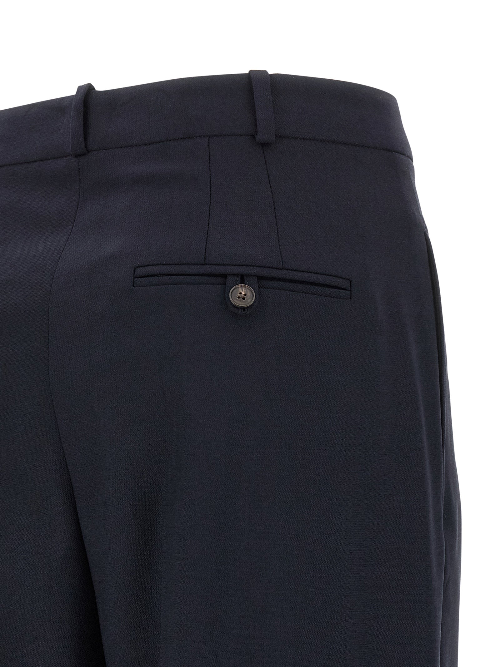 Pantalon décontracté en laine bleue de Polo Ralph Lauren, style casual, coupe classique, visible avec une ceinture et poches.