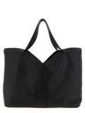 Sac à main Saint Laurent en cuir de veau noir, grand modèle avec poignées et design élégant.