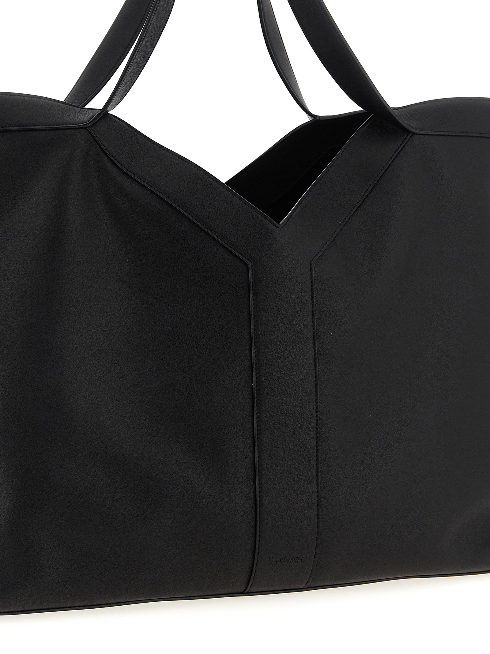 Sac à main Saint Laurent en cuir de veau noir, sac cabas élégant avec poignées et détails sophistiqués.