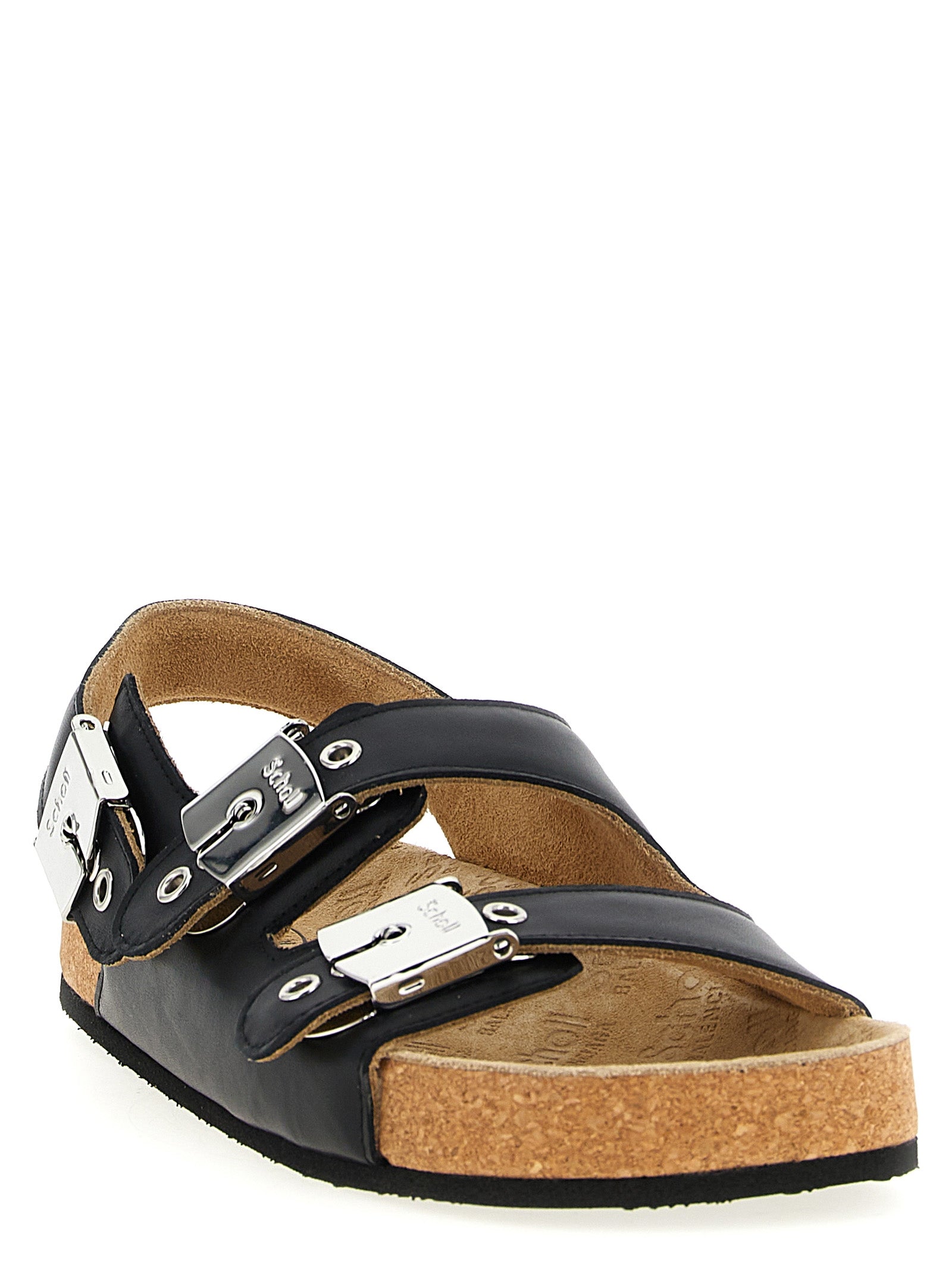 Sandales plates en cuir de veau noir Balenciaga, élégantes et minimalistes, visibles sur un fond neutre.