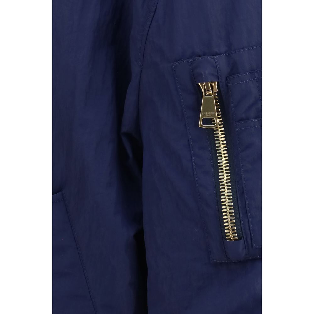 Veste bomber en polyamide bleu de la marque Balmain, avec détails stylés et finition soignée.