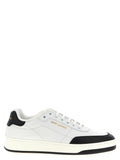 Chaussures sneakers basses en cuir de veau bicolore de la marque Saint Laurent, vue de face avec détails en cuir noir et blanc.