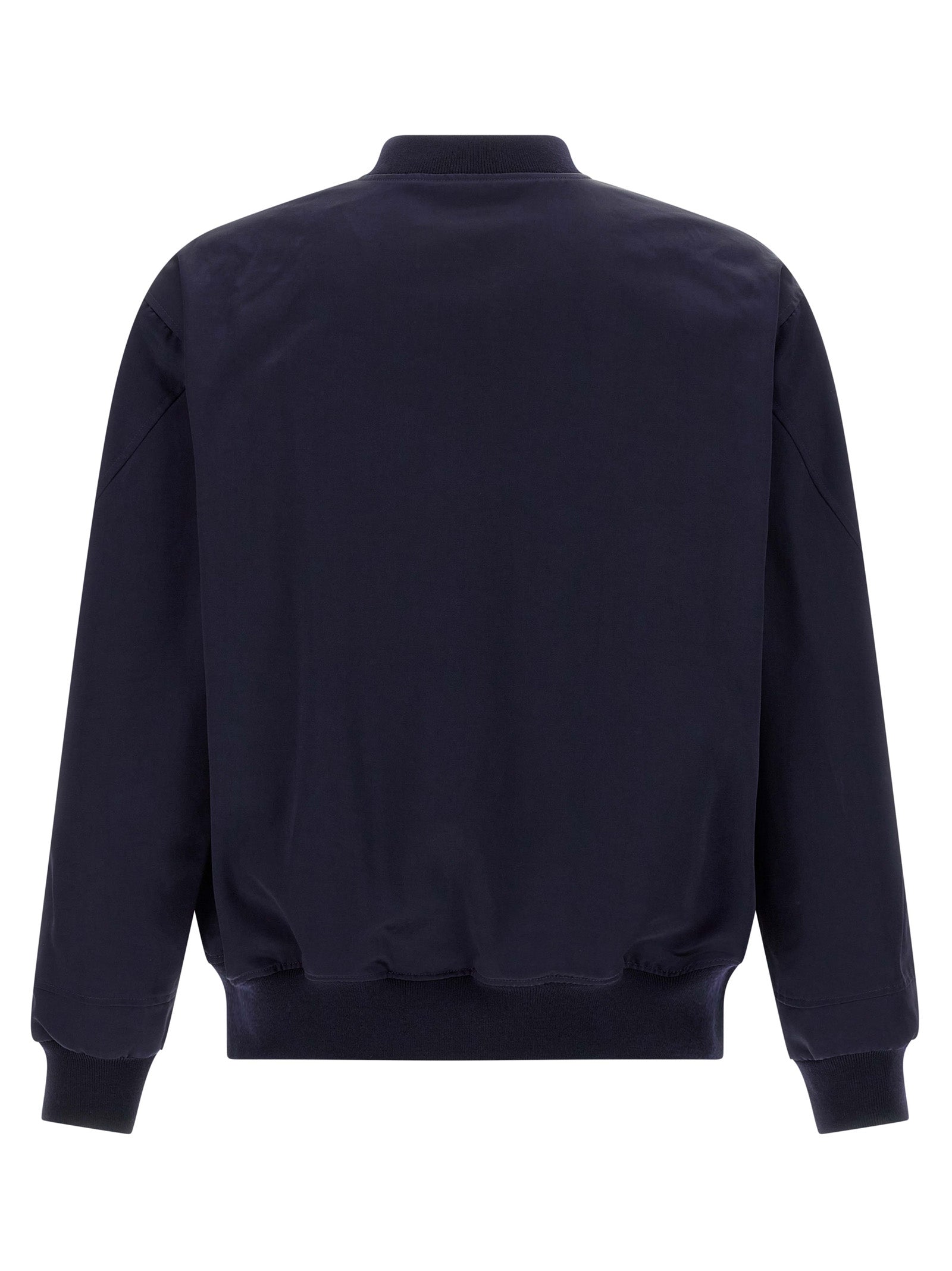 Veste bomber en coton bleu de la marque Givenchy, détail sur le design et la texture du tissu.