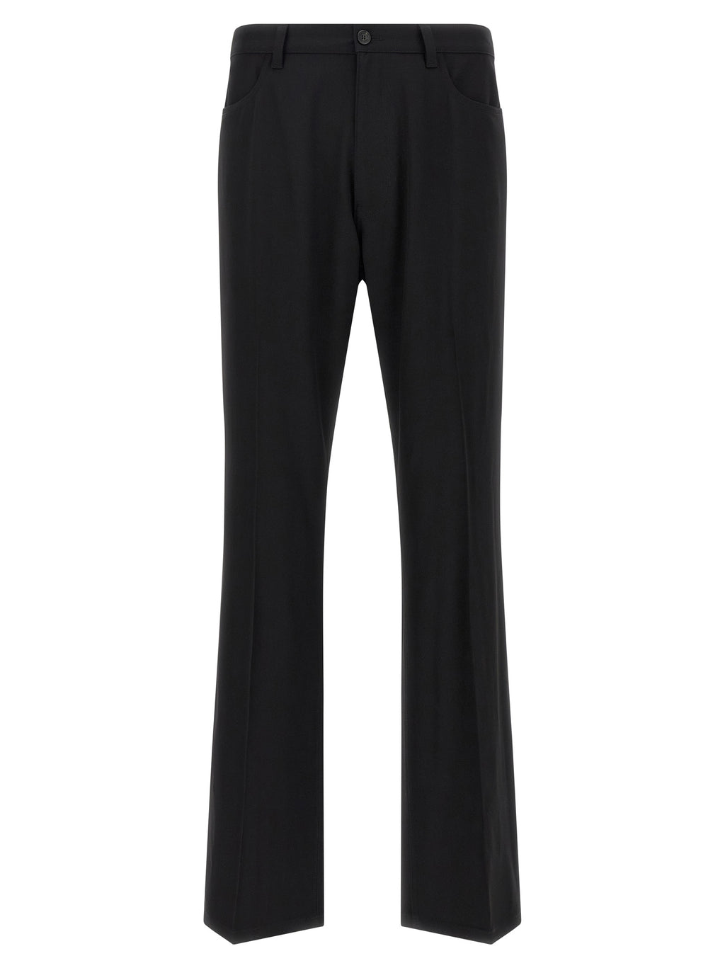 Pantalon en laine noir Balenciaga pour femme, coupe élégante et moderne, porté avec une chemise blanche.