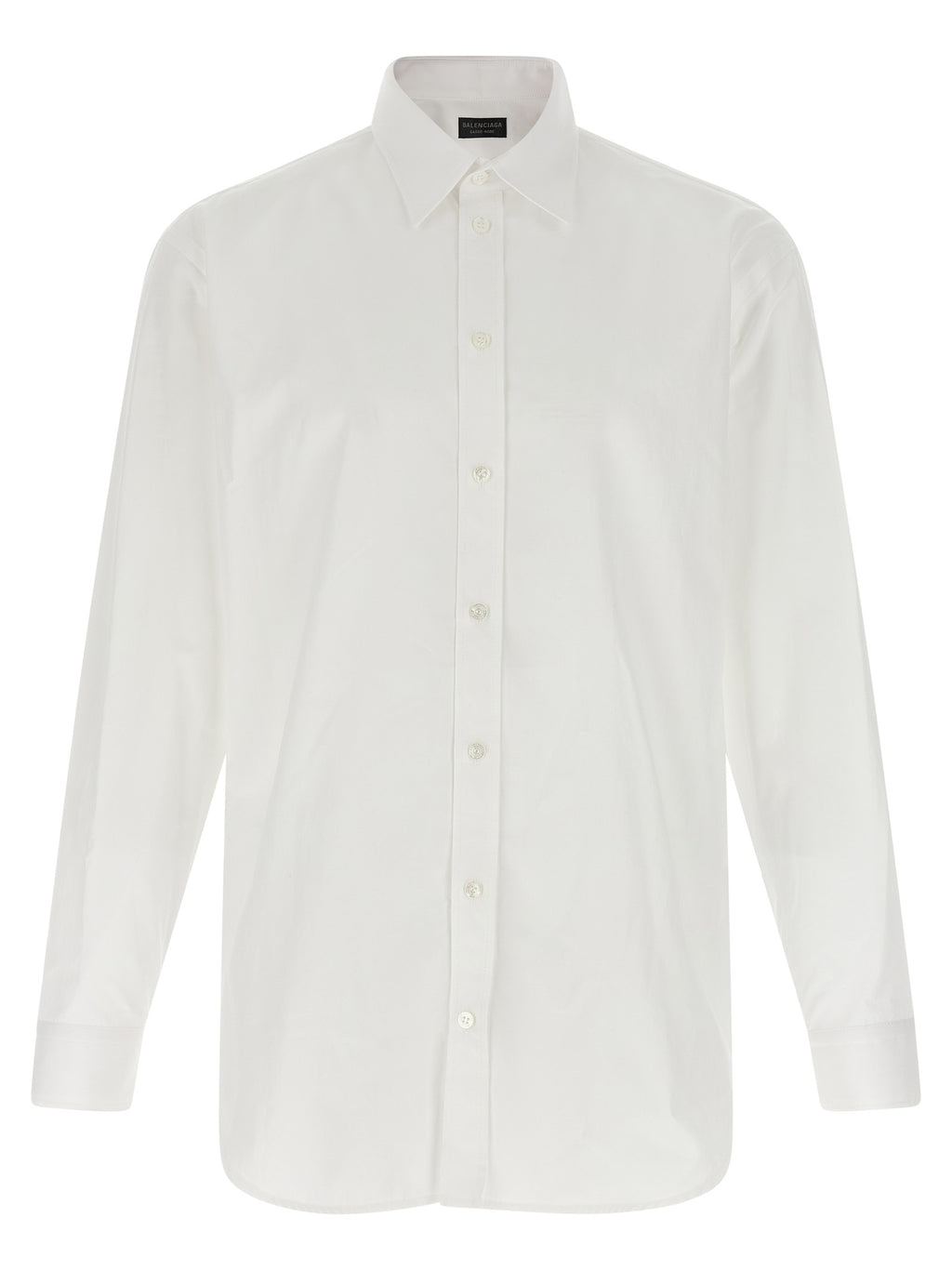 Chemise blanche en coton de la marque Balenciaga, vue rapprochée montrant le col et les manches.