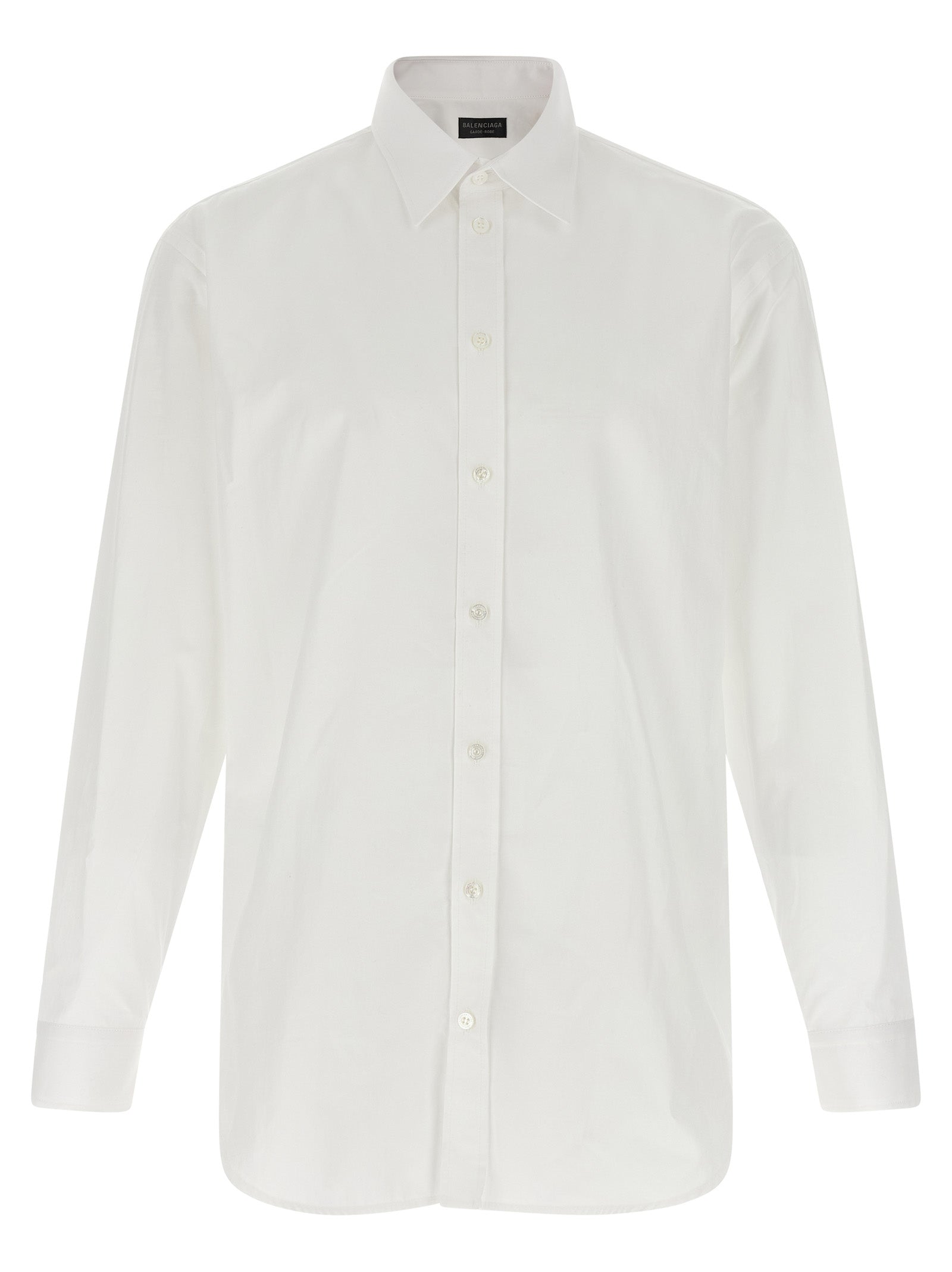 Chemise blanche en coton de la marque Balenciaga, vue rapprochée montrant le col et les manches.