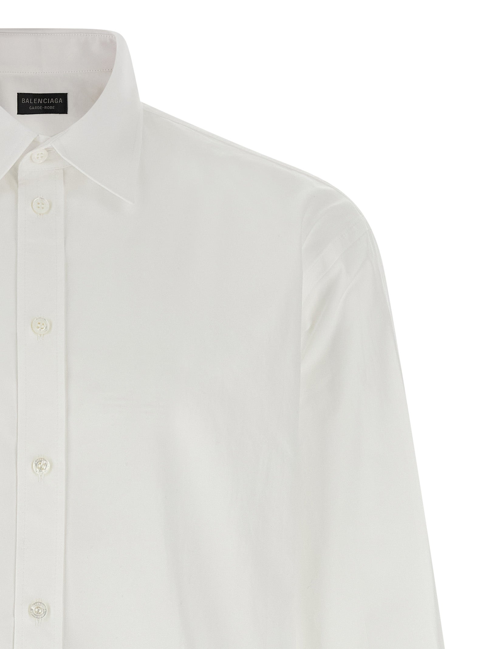 Chemise blanche en coton de la marque Balenciaga, vue de face, avec col classique et manches longues.