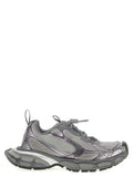 Chaussures de sport grises Balenciaga en polyester avec semelle blanche et design moderne, vues de face.