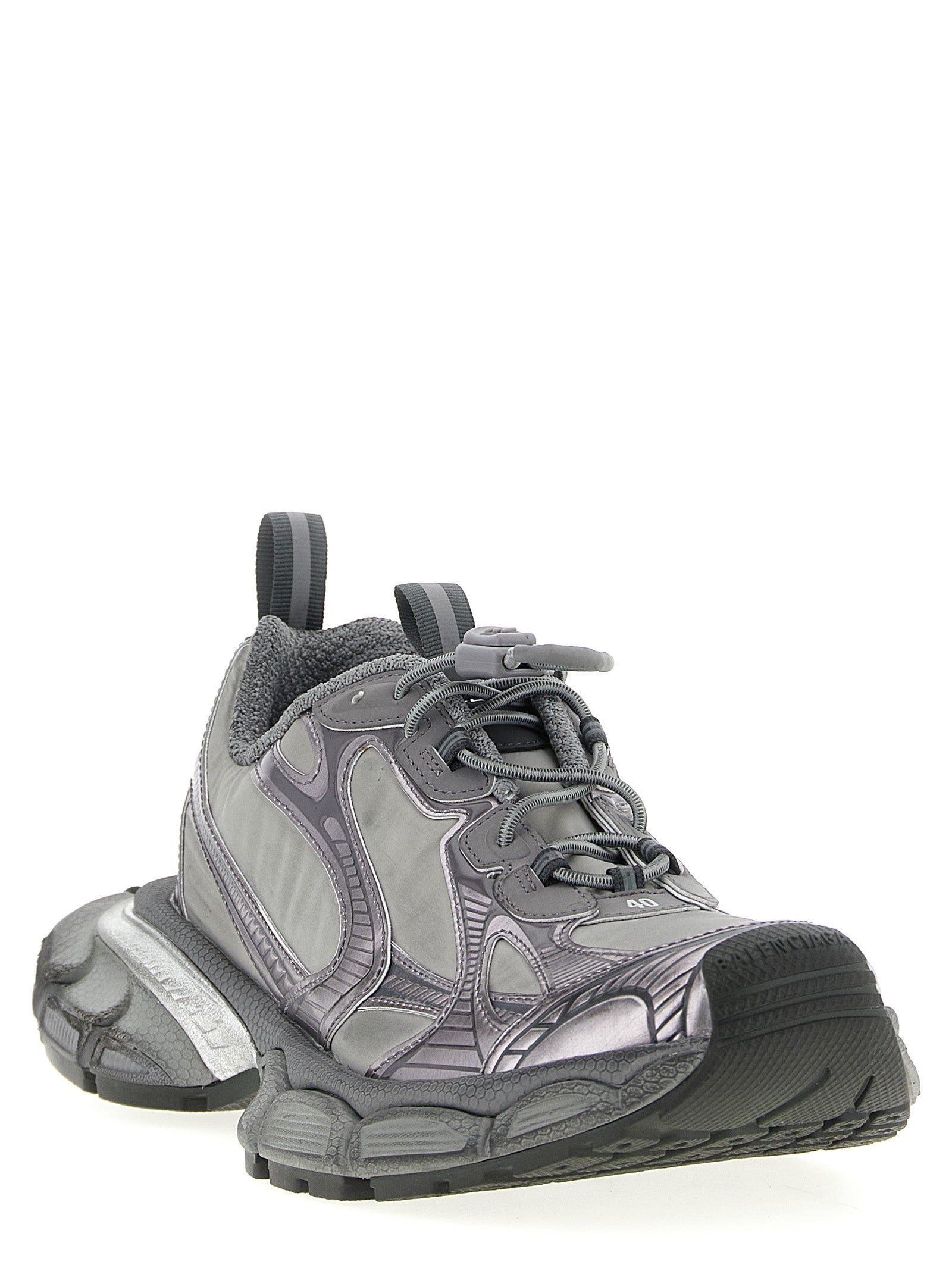 Chaussures de sport gris en polyester Balenciaga, baskets athlétiques modernes avec semelle épaisse et design tendance.