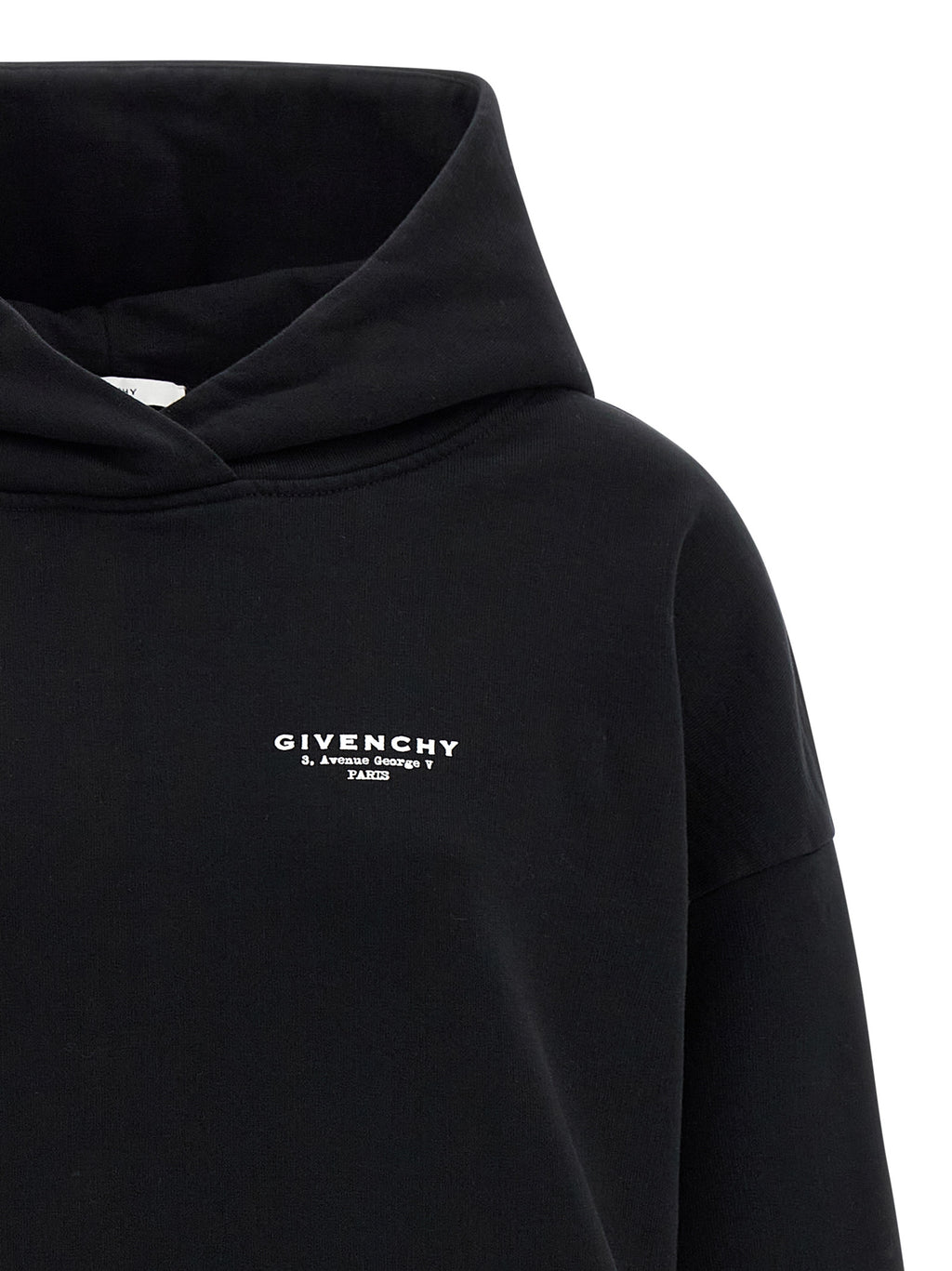 Sweat à capuche en coton bicolore Givenchy, noir et blanc, avec logo Givenchy sur la poitrine, vue de face.