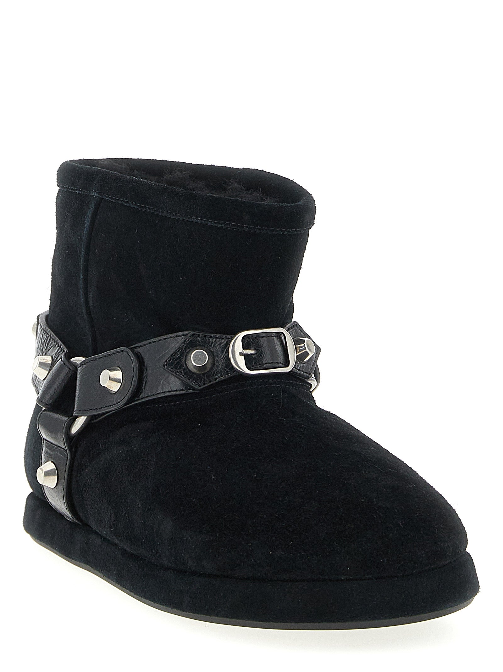 Bottines à la cheville en cuir de veau noir de Balenciaga, style élégant et moderne, visibles avec semelles et détails en cuir.