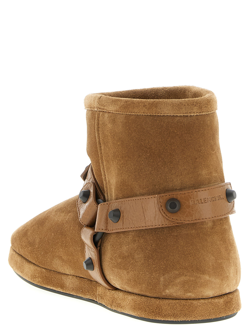Bottines beige en cuir de veau Balenciaga, ankle boots élégantes avec semelle robuste et design moderne.