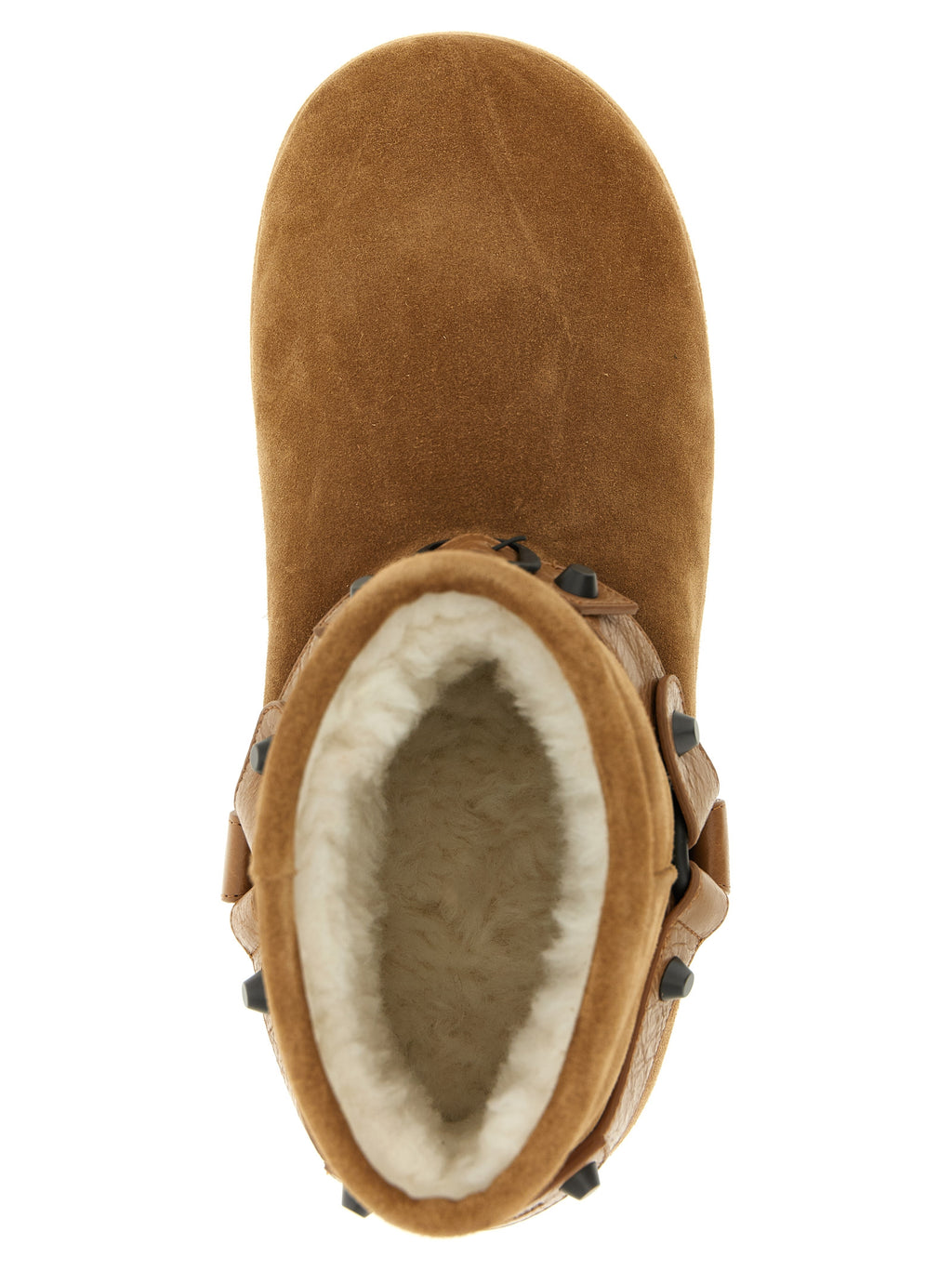 Bottes ankle en veau beige de Balenciaga avec semelle épaisse et design moderne, visibles en gros plan.