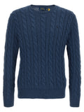 Cardigan en coton bleu Polo Ralph Lauren porté, avec col en V et boutons, style classique et élégant.