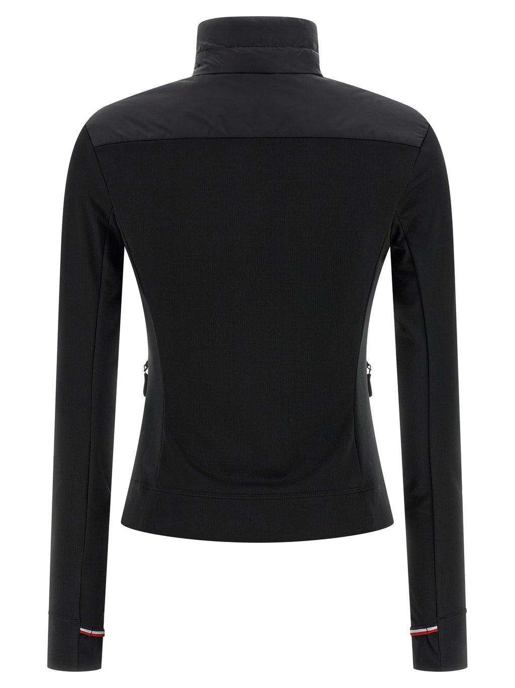 Cardigan noir en polyamide Moncler Grenoble, léger et chaud, avec détails de fermeture et textures visibles.