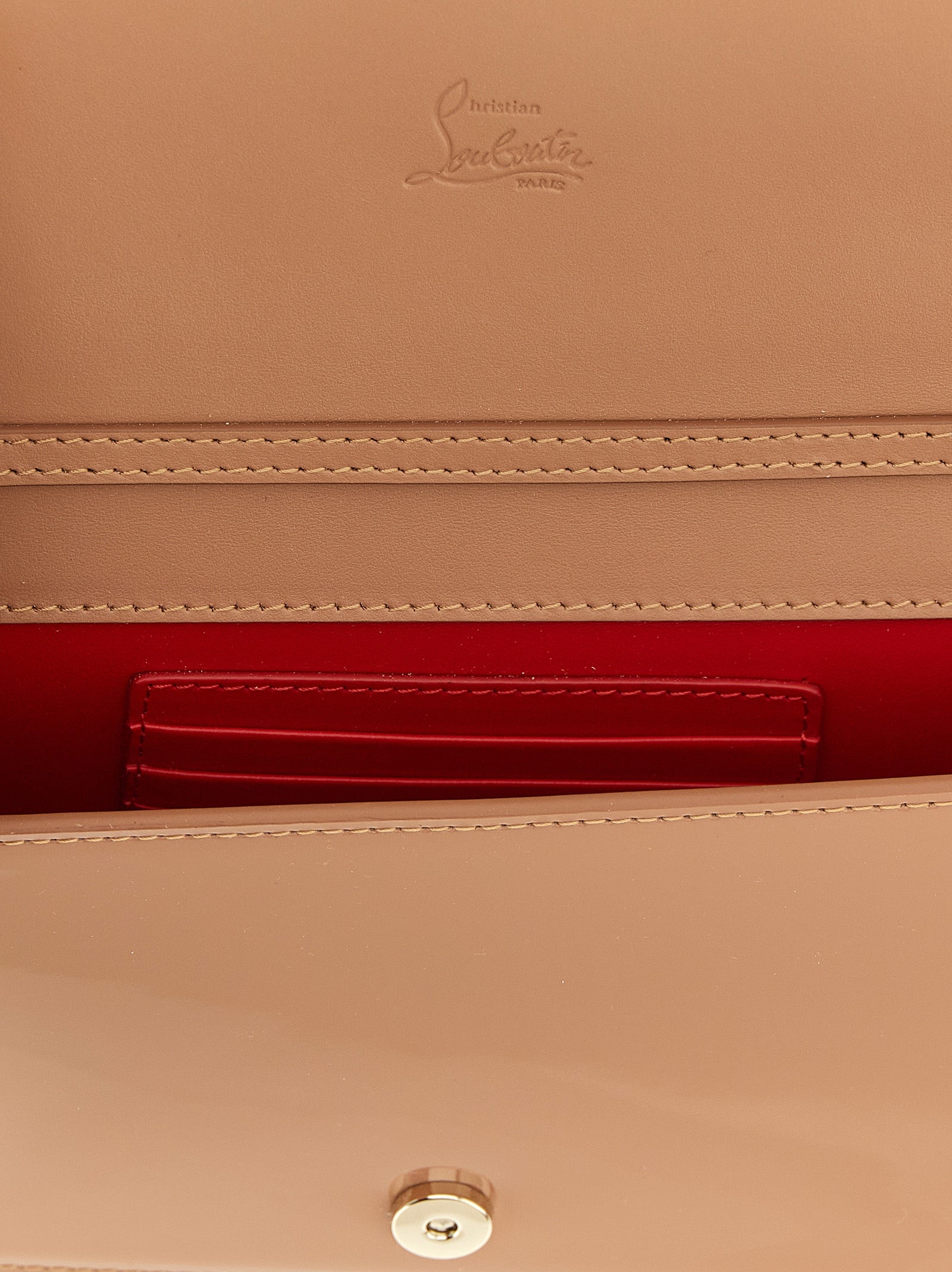 Sac à clutch Christian Louboutin en cuir de veau multicolore, avec détails élégants et finition raffinée.