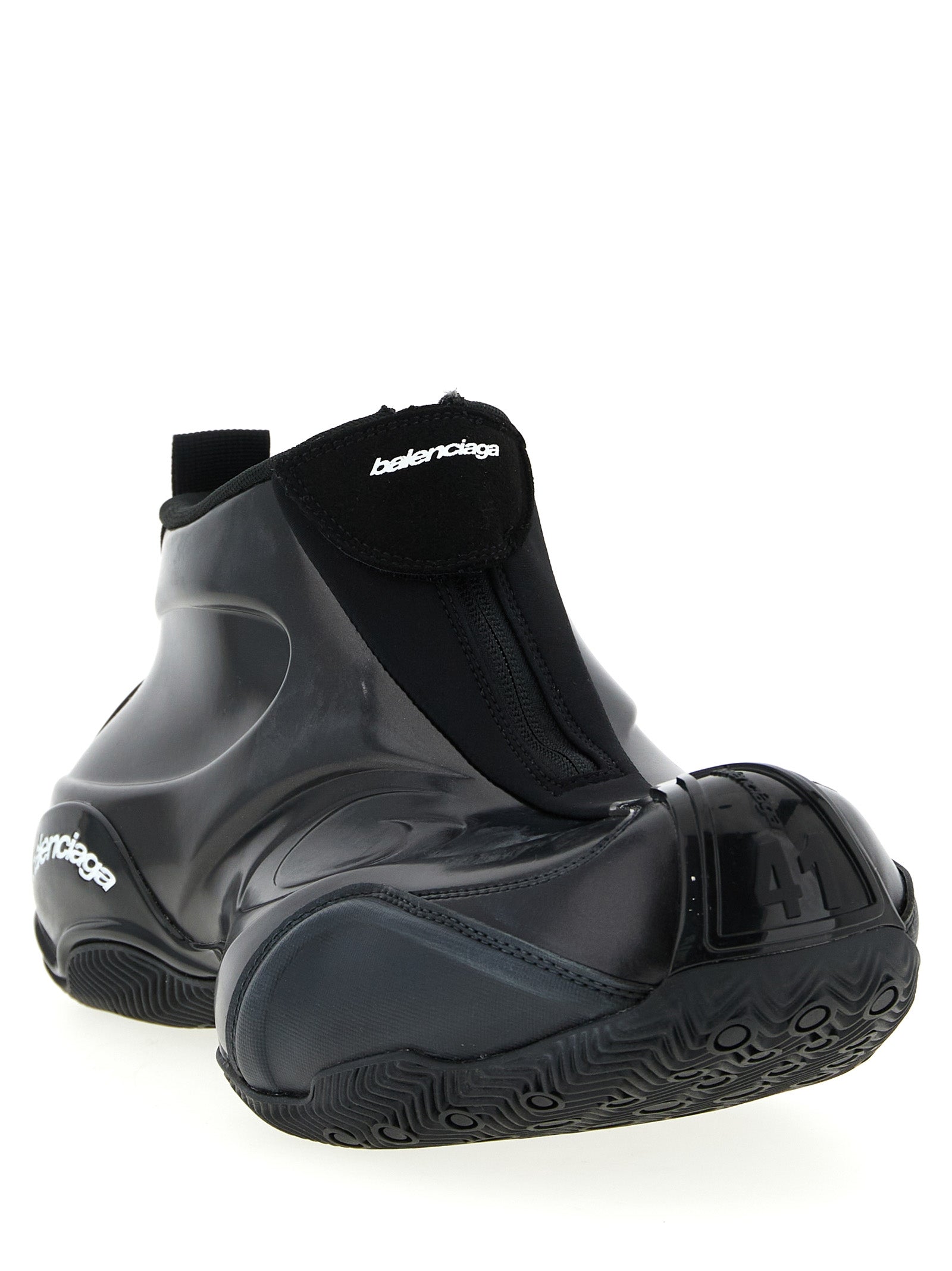 Chaussures de sport Balenciaga en polyester noir, baskets athlétiques modernes avec design élégant et sporty.