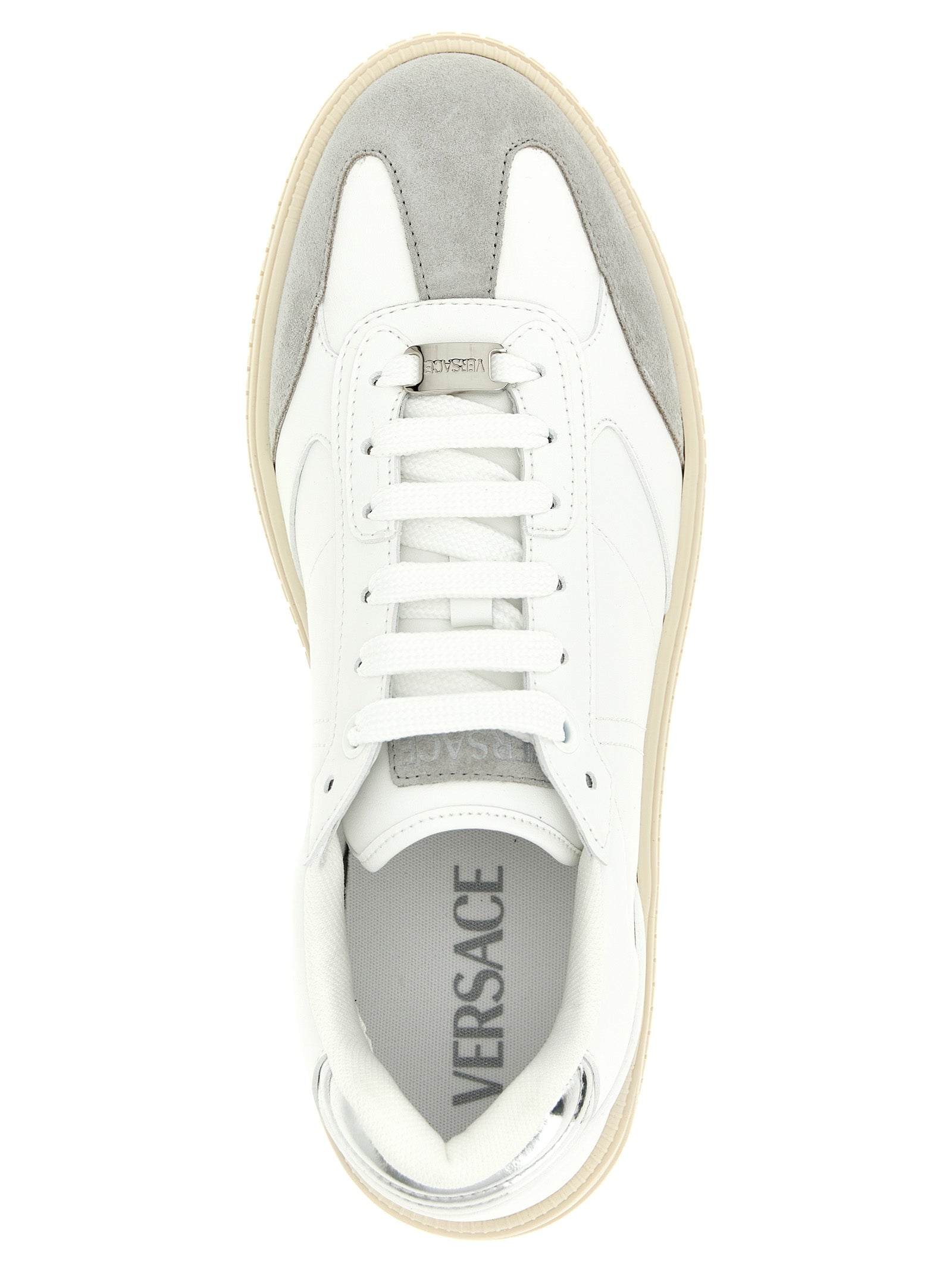 Chaussures basses en cuir de veau blanc de Versace, sneakers élégants et modernes pour homme.