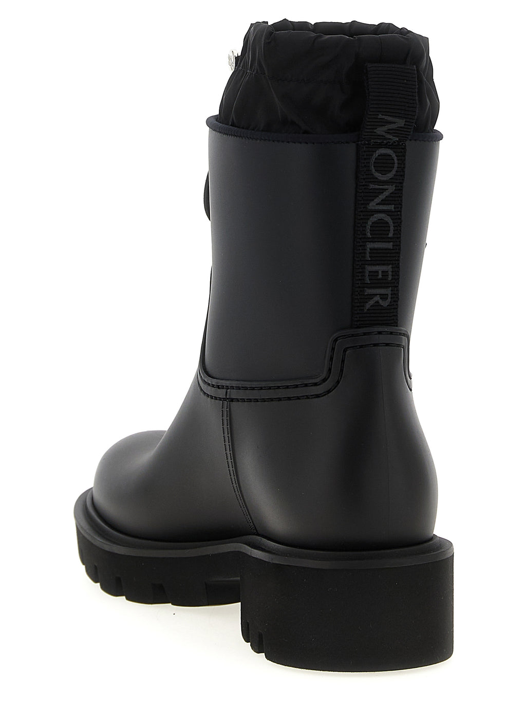 Bottes ankle en PVC noires de Moncler, style moderne, avec semelle épaisse et design résistant à l'eau.