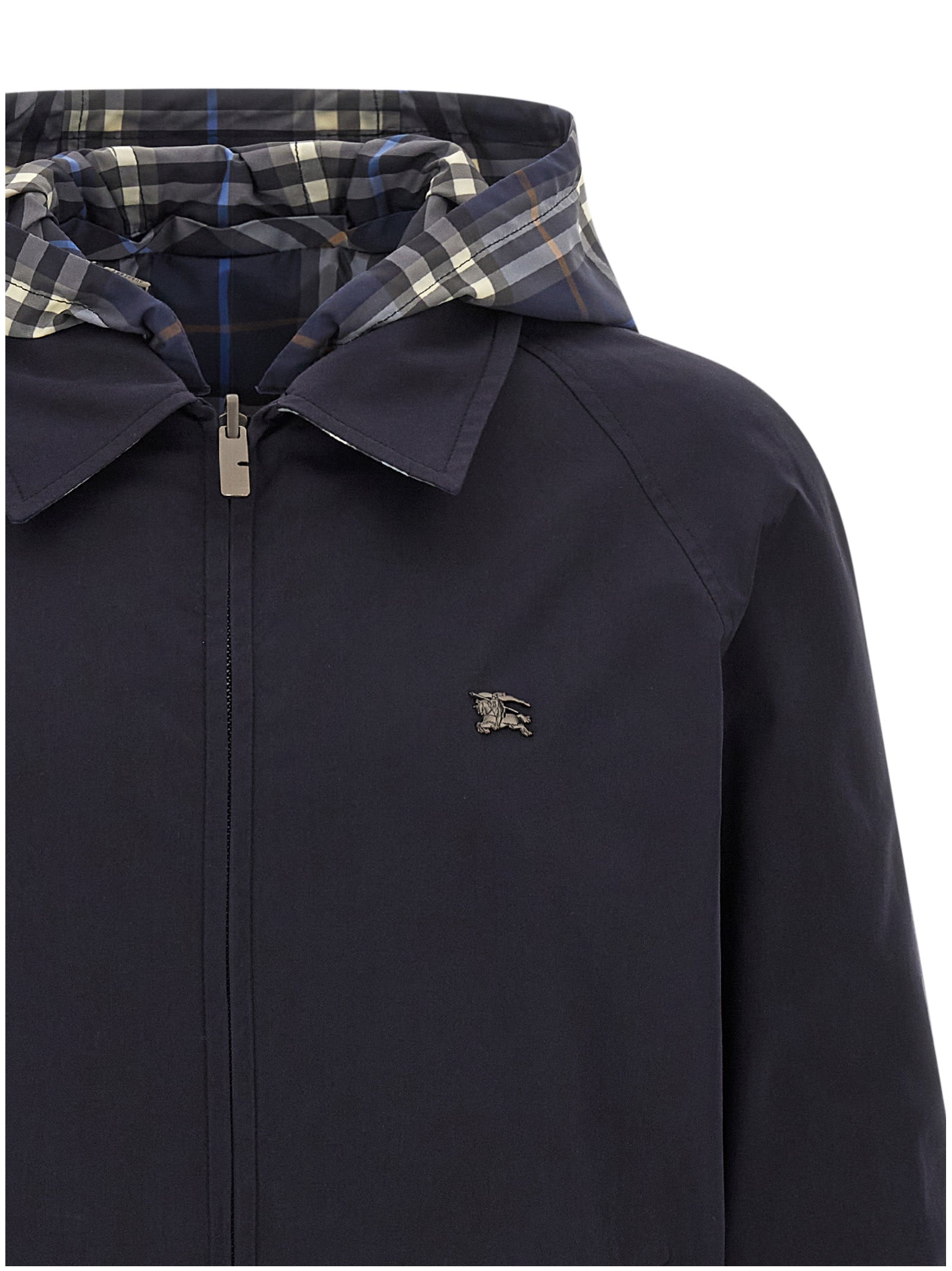 Veste longue en coton bleu de Burberry, style classique, avec détails élégants et finition soignée visible sur l'image.
