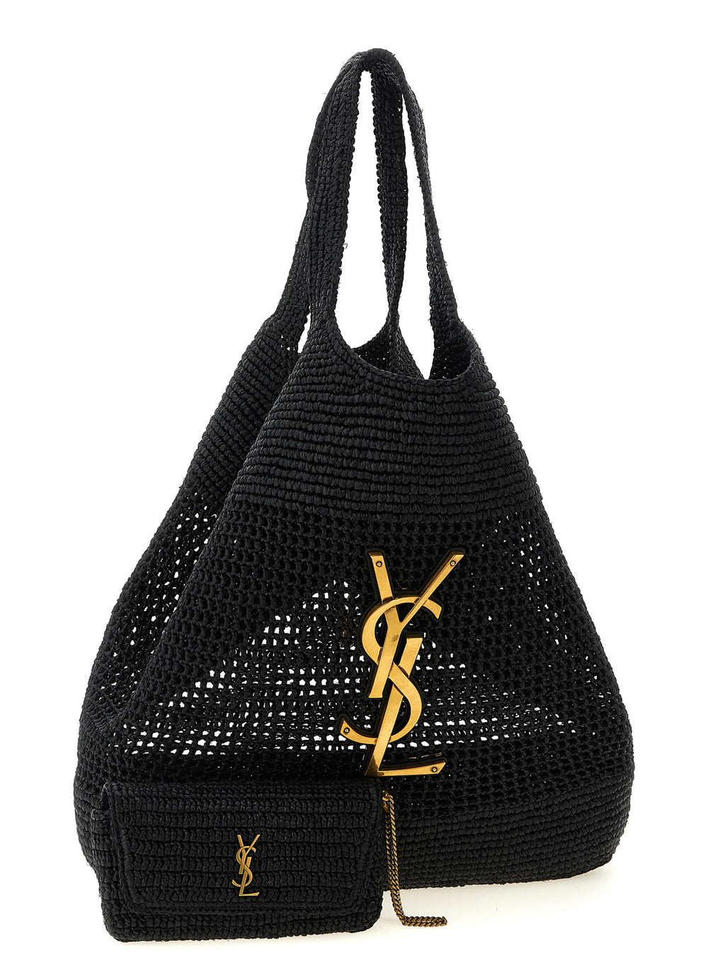 Sac cabas noir en raffia de Saint Laurent posé sur une surface en bois avec des poignées en cuir.