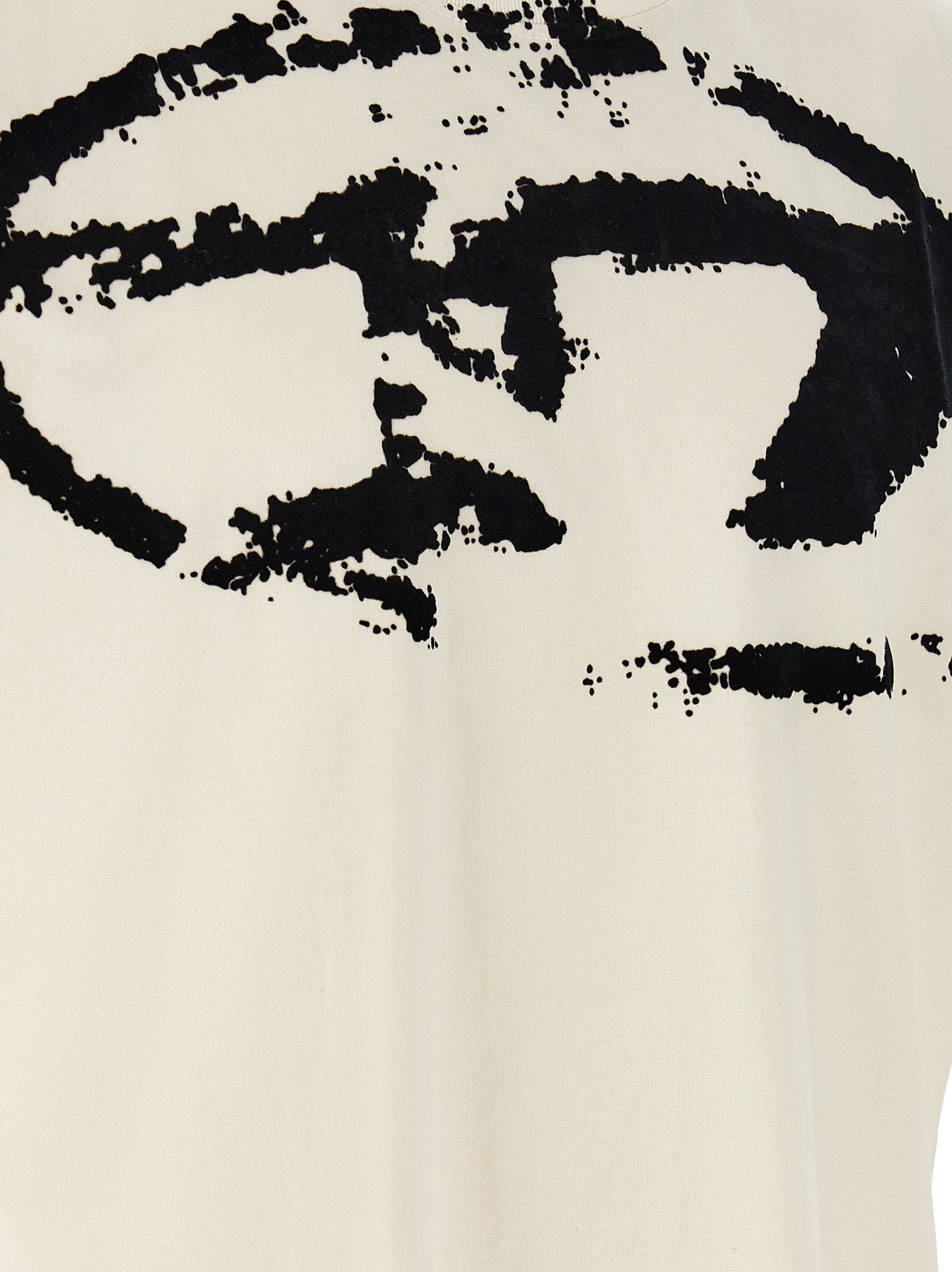T-shirt en coton bicolore de Diesel, coupe classique, visible en détail avec col rond et logo discret sur le devant.