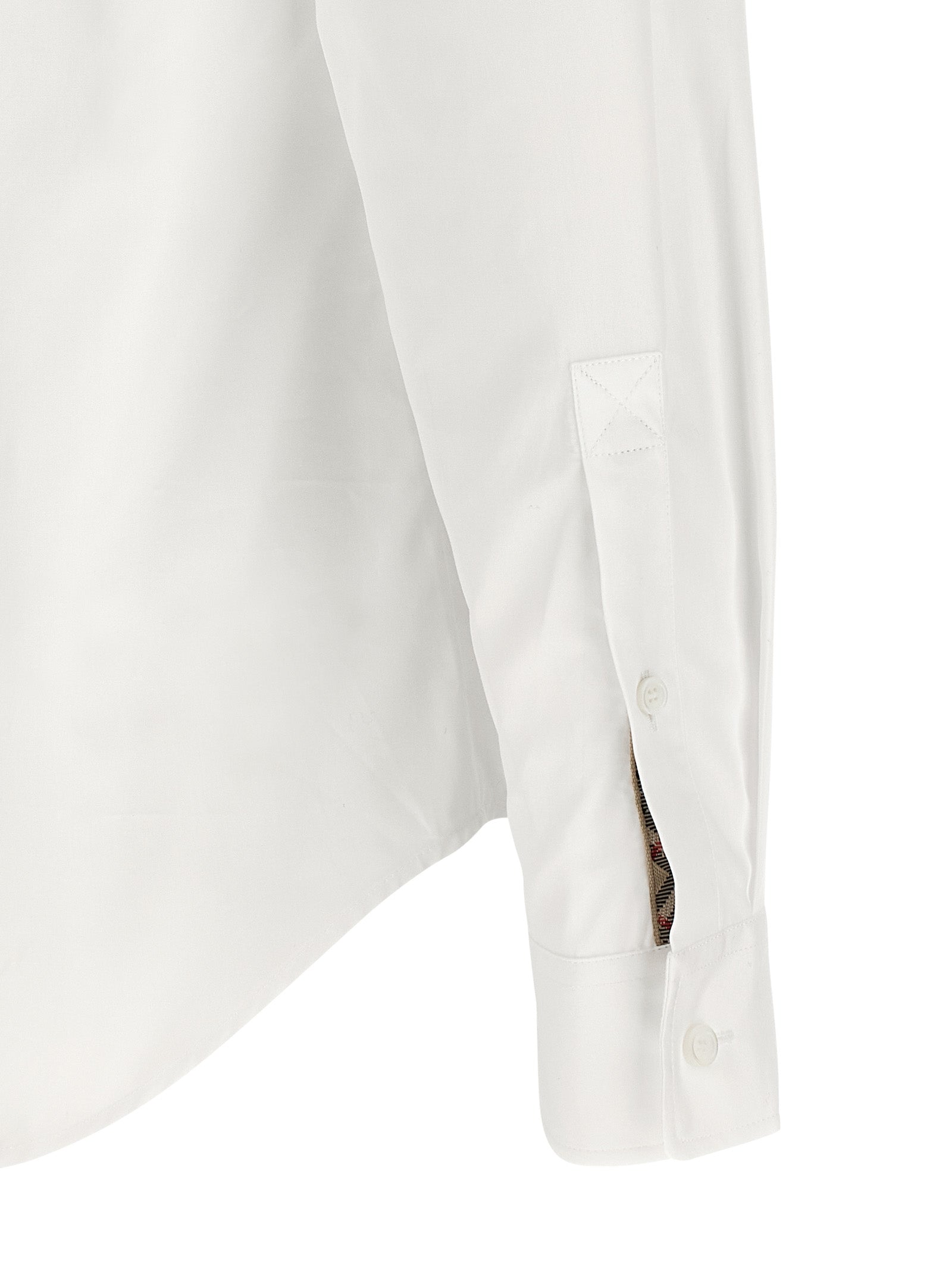 Chemise blanche en coton Burberry, élégante et classique, avec col et manches longues, parfaite pour un style sophistiqué.