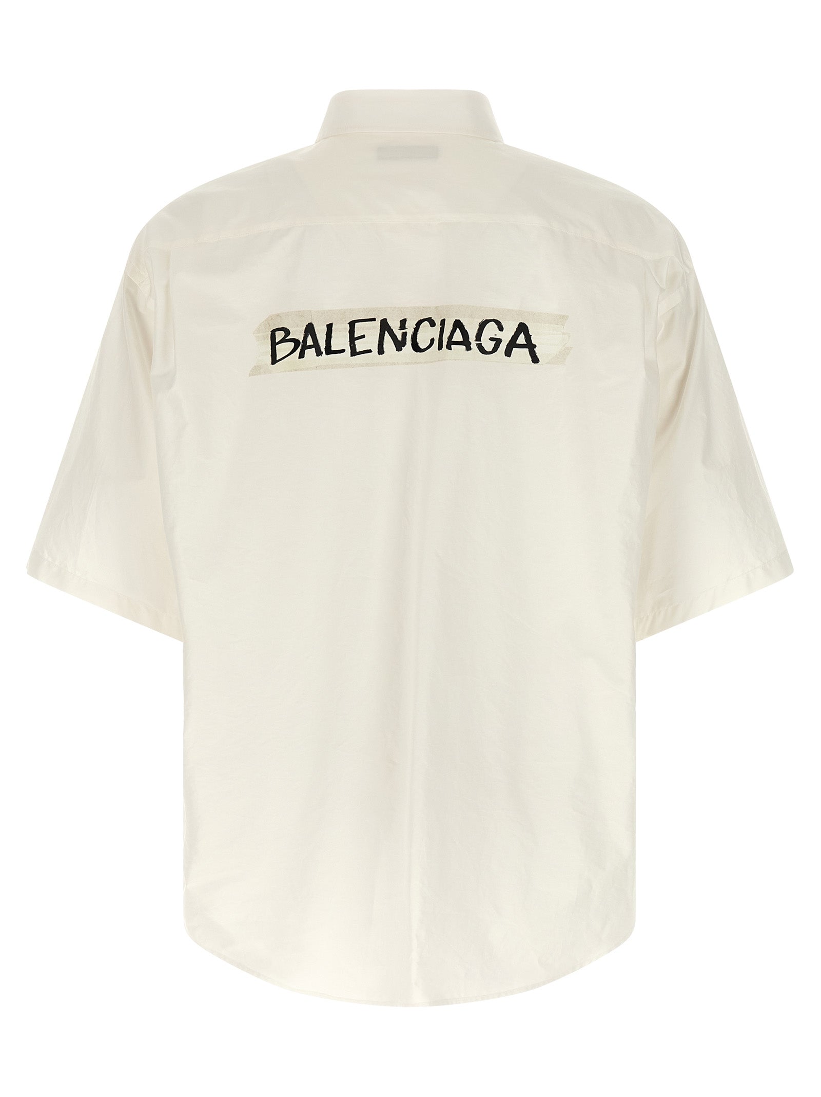 Chemise blanche en coton de la marque Balenciaga, vue détaillée du tissu et du design élégant.