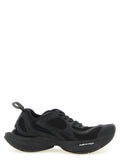 Chaussures de sport Balenciaga en polyester noir, baskets athlétiques élégantes avec design moderne et confort visible.