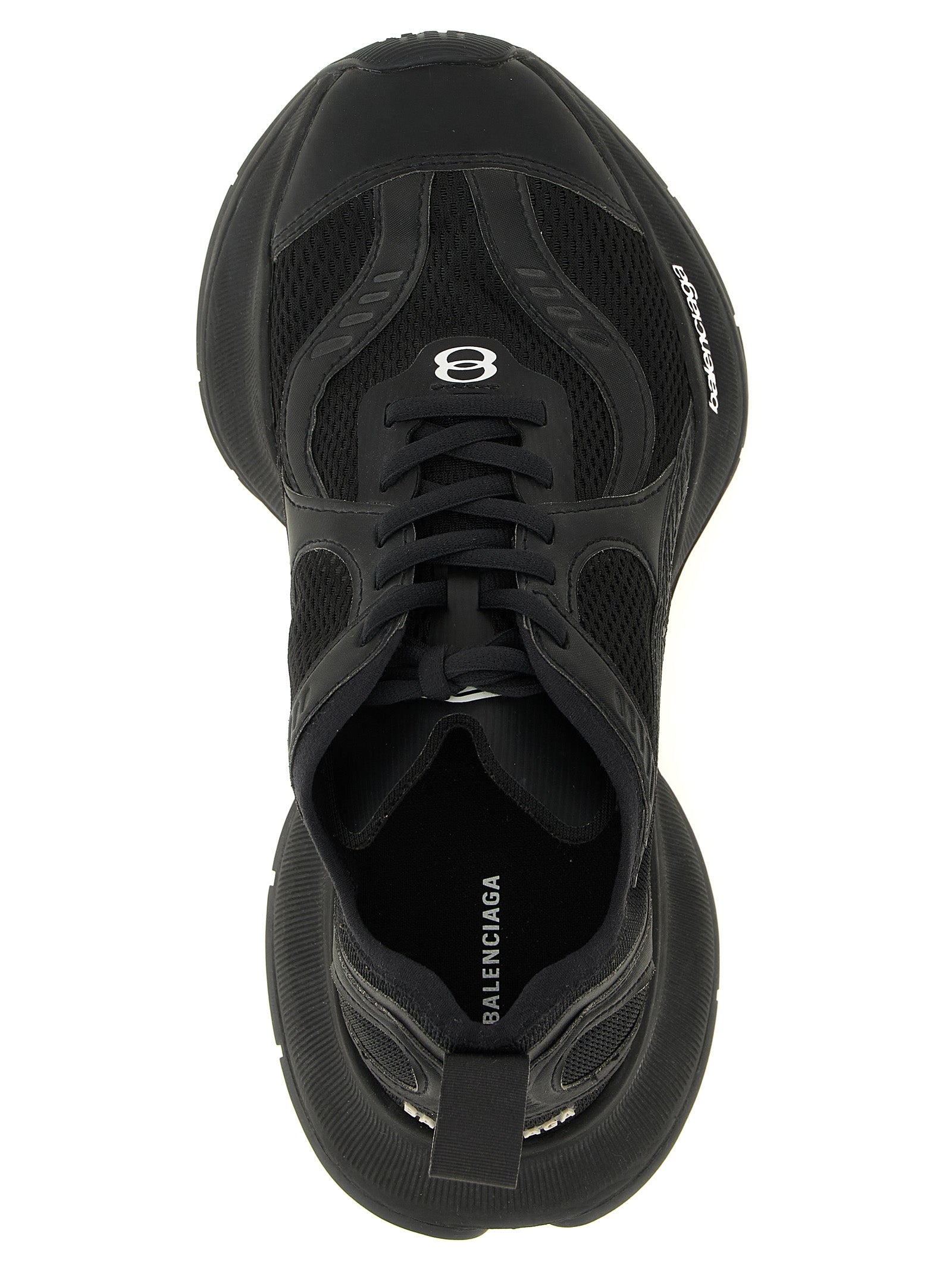 Chaussures de sport Balenciaga en polyester noir, baskets athlétiques modernes avec design tendance et semelle blanche.
