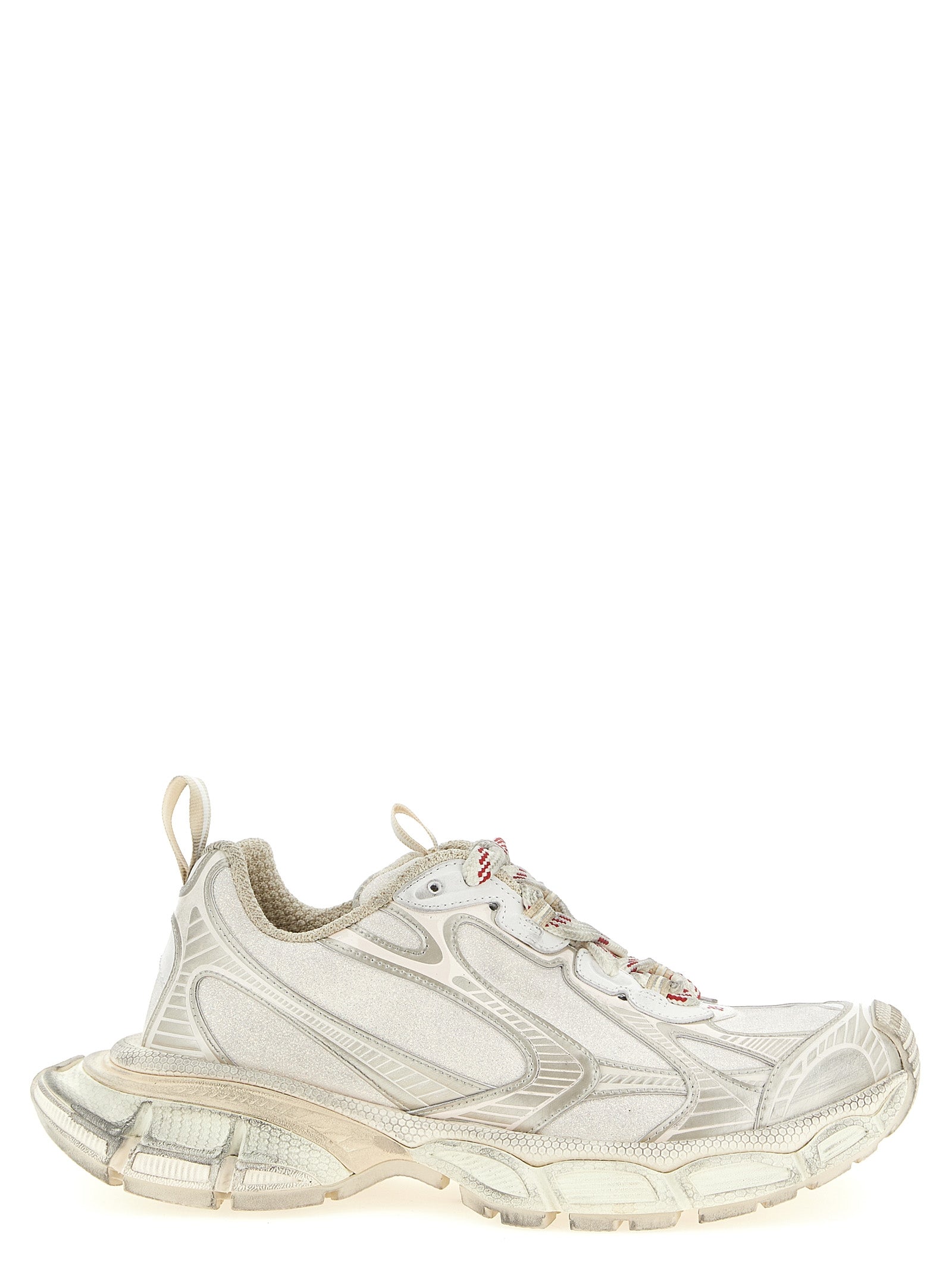 Chaussures de sport Balenciaga en polyethylene argenté, baskets athlétiques modernes avec semelle épaisse et design futuriste.