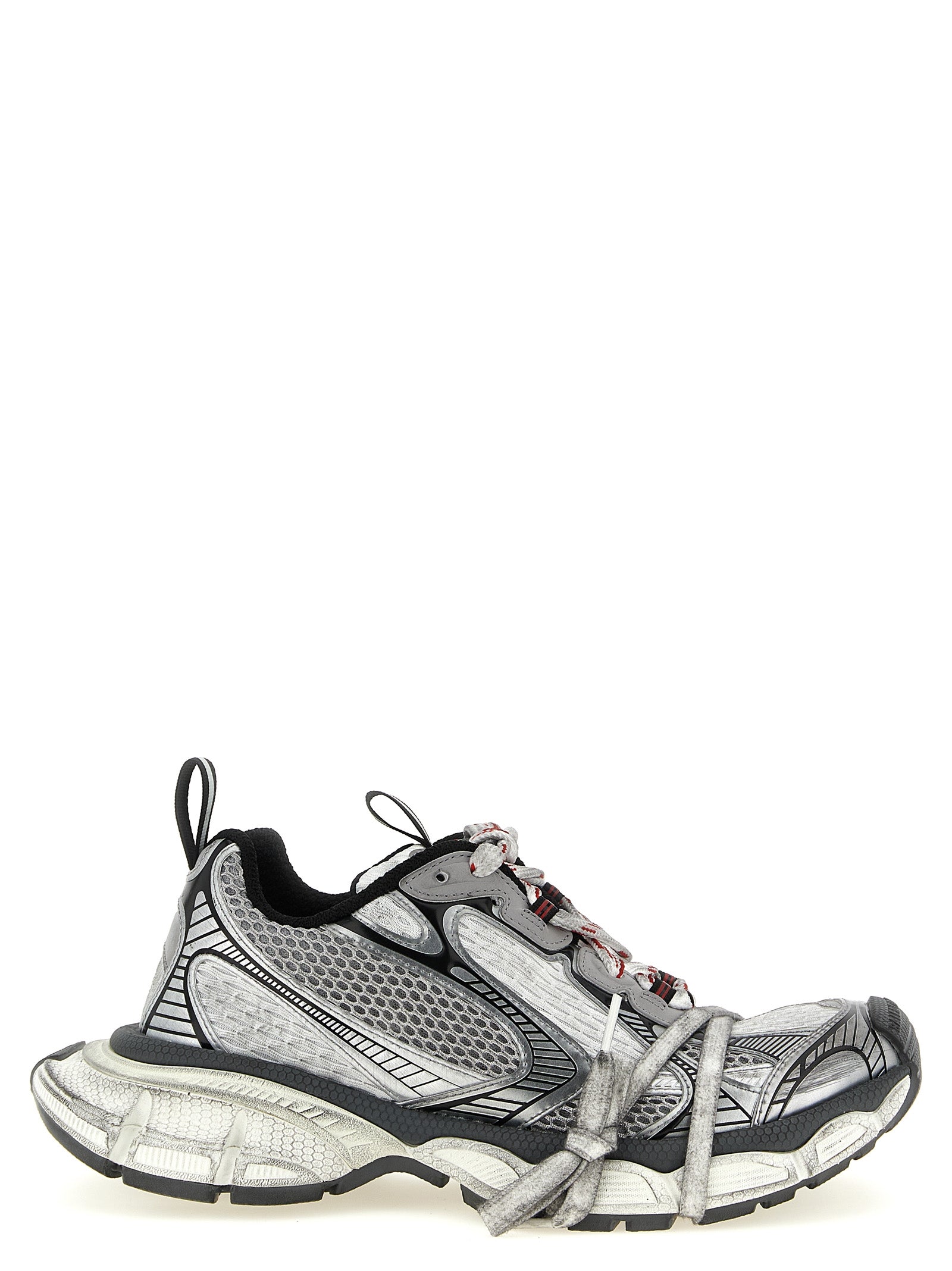 Chaussures de sport grises Balenciaga en polyéthylène avec design moderne et semelle épaisse, vue de face.