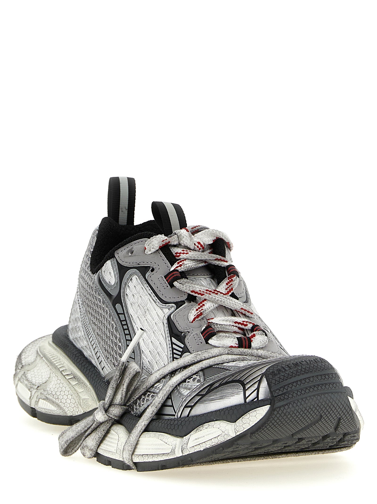 Chaussures de sport grises Balenciaga en polyéthylène, sneakers athlétiques modernes, vues de face avec détails de la marque.