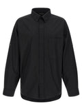 Chemise en coton noire Balenciaga avec col et manches longues, vue de face.