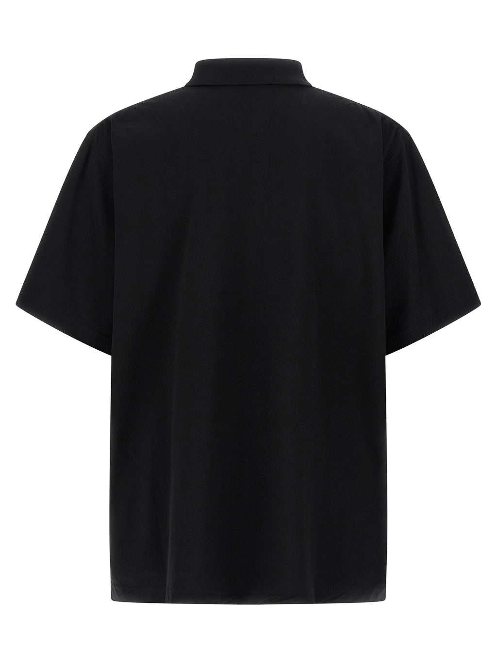 Chemise polo noire en coton de Balenciaga, vue de face, avec col classique et logo discret sur la poitrine.