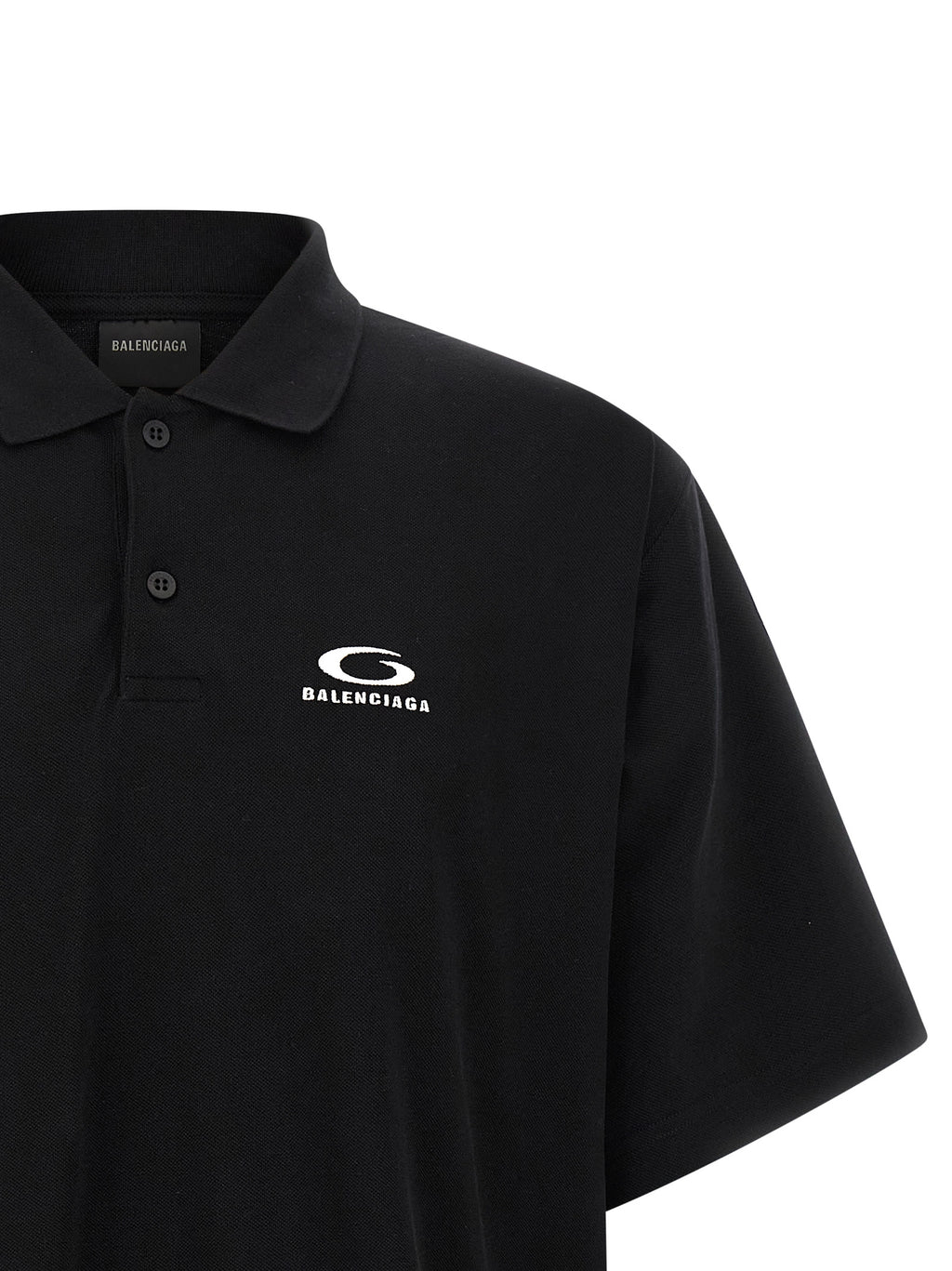 Chemise polo noire en coton de Balenciaga, vue de face, avec col classique et logo discret.