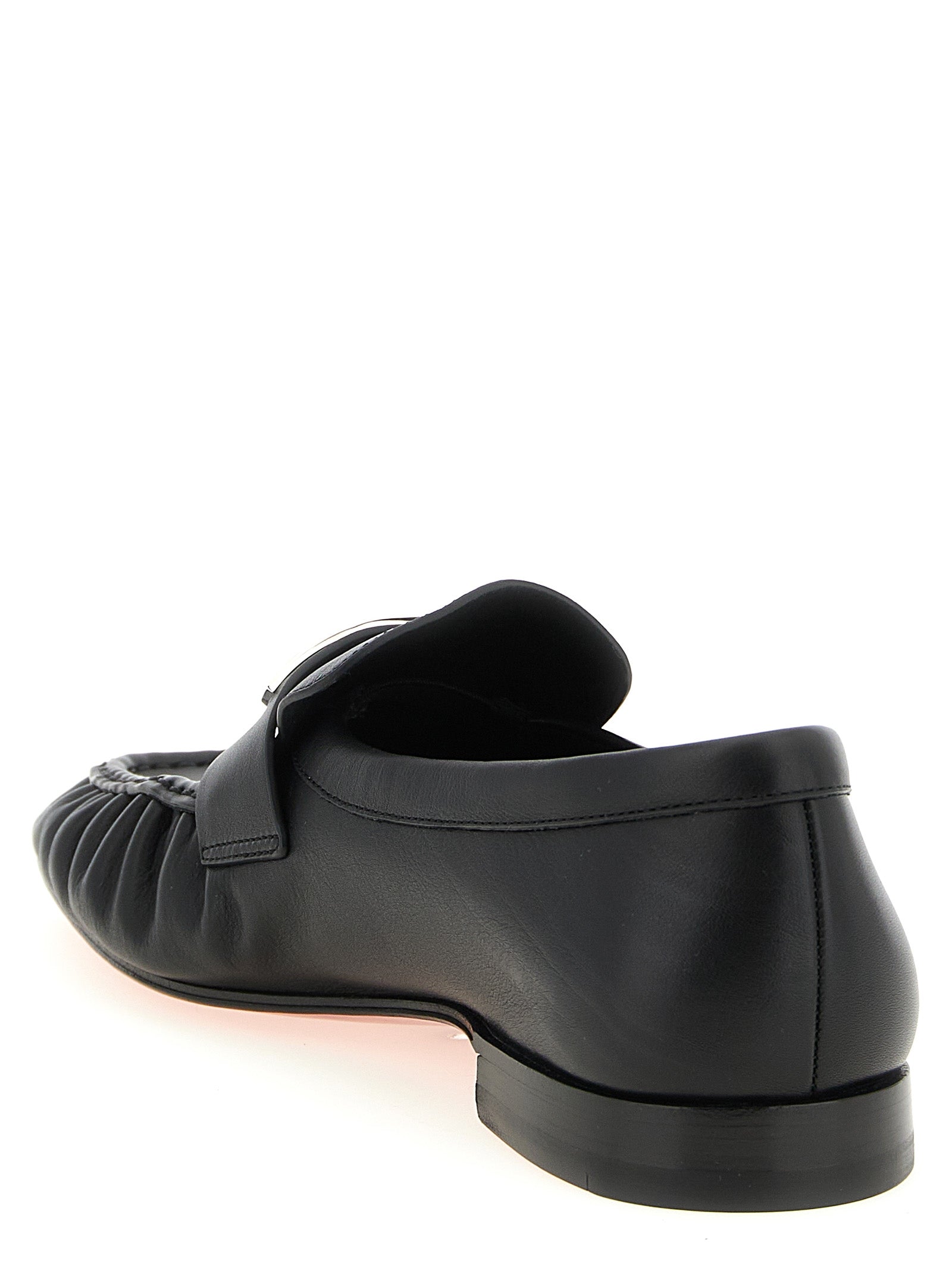 Mocassins Christian Louboutin en cuir de veau noir, chaussures slip-on élégantes pour homme, visibles avec finition raffinée.