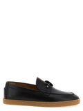 Chaussures Christian Louboutin en cuir de veau noir, mocassins sans lacets élégants avec détails sophistiqués.
