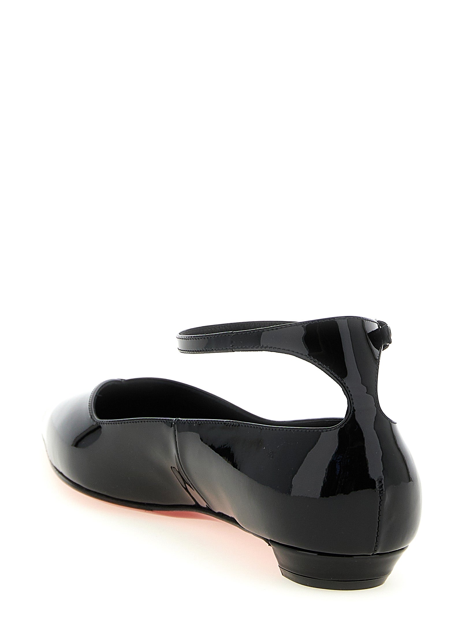 Chaussures ballerines Christian Louboutin en cuir de veau noir, élégantes et confortables, vues de face.