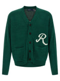 Cardigan en lin bicolore Polo Ralph Lauren avec col en V et boutons, porté sur un mannequin blanc.